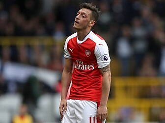 Mesut Ozil kicked a dressing r...